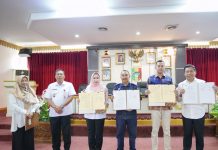PLN dan Pemkab Tanggamus Tandatangani MOU PAD, Bunda Dewi Ajak Warga Bayar Listrik Tepat Waktu