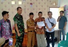 Kampung Negeri Ujan Mas Bagikan BLT DD